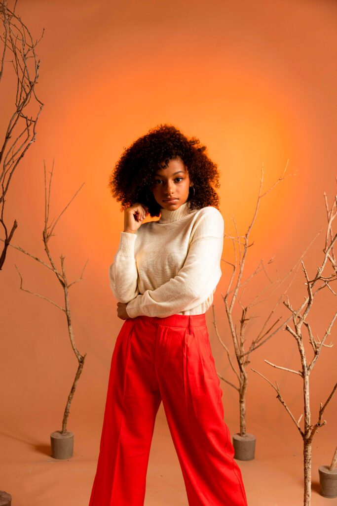 “Afro Gen-Z fashion model in power pose, retouched with Photoshop dodge & burn, frequency separation, and cyber-luxe gradient maps for editorial clarity and viral impact